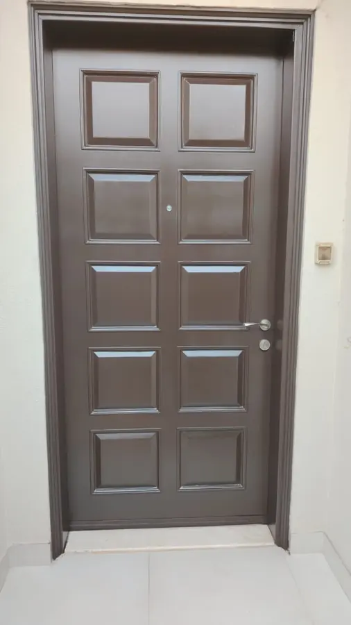 Dark panelled entrance door, fitted